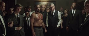 Movie still from “Game Night” (2018), directed by John Francis Daley – Medium shot, Low angle