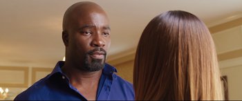 Movie still from “Girls Trip” (2017), directed by Malcolm D. Lee – A man and a woman talking to each other; Close Up shot, Over the shoulder angle
