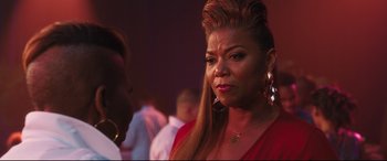 Movie still from “Girls Trip” (2017), directed by Malcolm D. Lee – An older woman with long blonde hair talking to a younger woman; Close Up shot, Over the shoulder angle