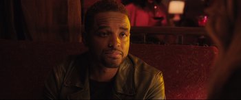 Movie still from “Girls Trip” (2017), directed by Malcolm D. Lee – A person wearing a leather jacket; Close Up shot, Over the shoulder angle