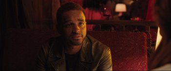 Movie still from “Girls Trip” (2017), directed by Malcolm D. Lee – A person sitting on a couch; Close Up shot, Over the shoulder angle