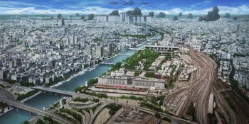 Movie still from “Evangelion: 3.0+1.01 Thrice Upon a Time” (2021), directed by Joe Fria – An aerial view of a large city with many buildings; Extreme Wide shot, High angle
