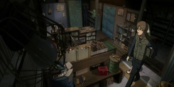 Movie still from “Evangelion: 3.0+1.01 Thrice Upon a Time” (2021), directed by Joe Fria – A room filled with lots of boxes and cabinets; Extreme Wide shot, High angle