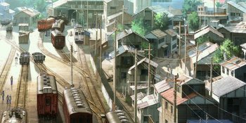 Movie still from “Evangelion: 3.0+1.01 Thrice Upon a Time” (2021), directed by Joe Fria – An aerial view of a train yard with trains on the tracks; Extreme Wide shot, High angle