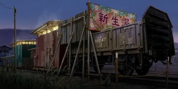 Movie still from “Evangelion: 3.0+1.01 Thrice Upon a Time” (2021), directed by Joe Fria – A train car with a painting on the side of it; Extreme Wide shot, Low angle
