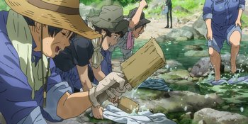 Movie still from “Evangelion: 3.0+1.01 Thrice Upon a Time” (2021), directed by Joe Fria – A group of people washing clothes in a river; Medium shot, High angle