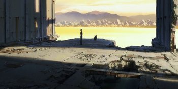 Movie still from “Evangelion: 3.0+1.01 Thrice Upon a Time” (2021), directed by Joe Fria – Two people are standing on the edge of the water; Extreme Wide shot, High angle