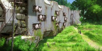 Movie still from “Evangelion: 3.0+1.01 Thrice Upon a Time” (2021), directed by Joe Fria – An old building with many lights on the side of it; Extreme Wide shot, Low angle