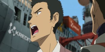 Movie still from “Evangelion: 3.0+1.01 Thrice Upon a Time” (2021), directed by Joe Fria – An animated picture of a man with his mouth wide open; Close Up shot, Low angle