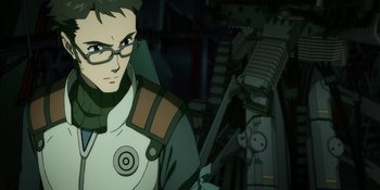 Movie still from “Evangelion: 3.0+1.01 Thrice Upon a Time” (2021), directed by Joe Fria – An animated man with glasses is looking at the camera; Close Up shot, Over the shoulder angle