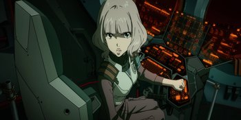 Movie still from “Evangelion: 3.0+1.01 Thrice Upon a Time” (2021), directed by Joe Fria – An anime character is sitting in a chair; Close Up shot, High angle