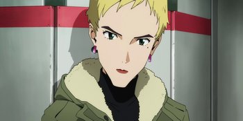 Movie still from “Evangelion: 3.0+1.01 Thrice Upon a Time” (2021), directed by Joe Fria – A person with short blonde hair; Close Up shot, Low angle