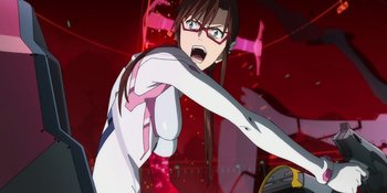 Movie still from “Evangelion: 3.0+1.01 Thrice Upon a Time” (2021), directed by Joe Fria – A woman in white shirt and red shorts playing a video game; Close Up shot, Low angle