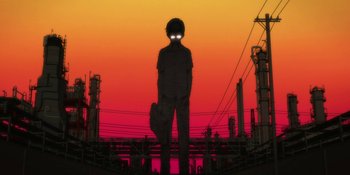 Movie still from “Evangelion: 3.0+1.01 Thrice Upon a Time” (2021), directed by Joe Fria – A man standing in front of an oil refinery at sunset; Extreme Wide shot, Low angle