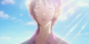 Movie still from “Evangelion: 3.0+1.01 Thrice Upon a Time” (2021), directed by Joe Fria – A man with long white hair and a purple shirt; Close Up shot, Low angle