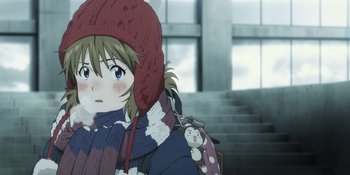 Movie still from “Evangelion: 3.0+1.01 Thrice Upon a Time” (2021), directed by Joe Fria – A young girl wearing a red hat and a blue coat; Close Up shot, Over the shoulder angle