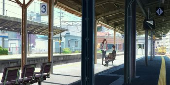 Movie still from “Evangelion: 3.0+1.01 Thrice Upon a Time” (2021), directed by Joe Fria – Two people waiting for a train at a train station; Extreme Wide shot, Over the shoulder angle