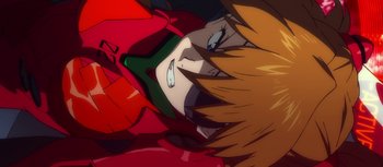 Movie still from “Evangelion: 3.0 You Can (Not) Redo” (2012), directed by Kiyotaka Suzuki – An animated picture of a person with a helmet on; Extreme Close Up shot, Overhead angle