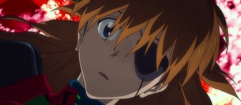 Movie still from “Evangelion: 3.0 You Can (Not) Redo” (2012), directed by Kiyotaka Suzuki – A person's face with a pair of headphones on; Extreme Close Up shot, Low angle
