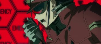 Movie still from “Evangelion: 3.0 You Can (Not) Redo” (2012), directed by Kiyotaka Suzuki – An animated picture of a man in a red jacket; Close Up shot, Low angle