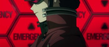 Movie still from “Evangelion: 3.0 You Can (Not) Redo” (2012), directed by Kiyotaka Suzuki – View of a man's face in a red jacket; Close Up shot, Low angle