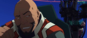 Movie still from “Evangelion: 3.0 You Can (Not) Redo” (2012), directed by Kiyotaka Suzuki – An animated bald man with a beard and mustache; Close Up shot, Low angle