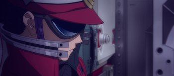 Movie still from “Evangelion: 3.0 You Can (Not) Redo” (2012), directed by Kiyotaka Suzuki – A person wearing goggles and a hat; Extreme Close Up shot, Over the shoulder angle