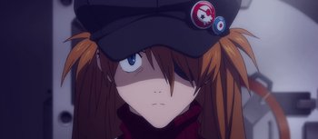 Movie still from “Evangelion: 3.0 You Can (Not) Redo” (2012), directed by Kiyotaka Suzuki – A girl's face wearing a baseball cap; Close Up shot, Low angle