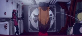 Movie still from “Evangelion: 3.0 You Can (Not) Redo” (2012), directed by Kiyotaka Suzuki – A woman standing in front of an open door; Medium shot, Overhead angle