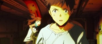 Movie still from “Evangelion: 3.0 You Can (Not) Redo” (2012), directed by Kiyotaka Suzuki – A man and a woman are looking into the distance; Close Up shot, Low angle