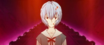 Movie still from “Evangelion: 3.0 You Can (Not) Redo” (2012), directed by Kiyotaka Suzuki – An anime character with white hair and a red bow tie; Close Up shot, High angle