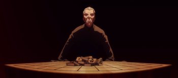 Movie still from “Evangelion: 3.0 You Can (Not) Redo” (2012), directed by Kiyotaka Suzuki – A man sitting at a table with a pile of money on it; Medium shot, Low angle