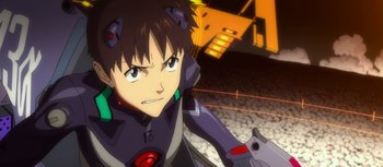 Movie still from “Evangelion: 3.0 You Can (Not) Redo” (2012), directed by Kiyotaka Suzuki – An anime character is looking at the camera; Close Up shot, Low angle