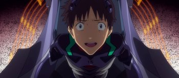 Movie still from “Evangelion: 3.0 You Can (Not) Redo” (2012), directed by Kiyotaka Suzuki – An anime character is looking up at the camera; Close Up shot, Overhead angle