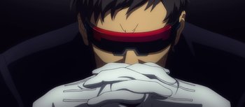 Movie still from “Evangelion: 3.0 You Can (Not) Redo” (2012), directed by Kiyotaka Suzuki – An anime character with white gloves and red glasses; Close Up shot, Low angle