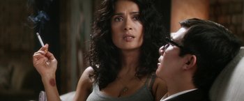 Movie still from “Everly” (2014), directed by Joe Lynch – A person with a camera; Close Up shot, Over the shoulder angle