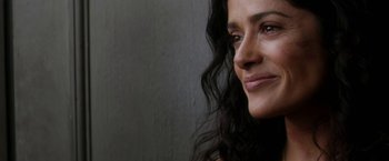 Movie still from “Everly” (2014), directed by Joe Lynch – A person with long hair; Close Up shot, Overhead angle