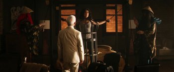 Movie still from “Everly” (2014), directed by Joe Lynch – A man and a woman are tied up in a room; Wide shot, Low angle