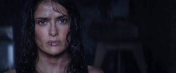 Movie still from “Everly” (2014), directed by Joe Lynch – A person with wet hair; Close Up shot, Low angle