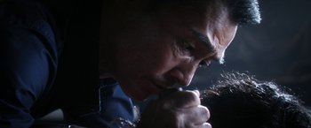 Movie still from “Everly” (2014), directed by Joe Lynch – A person holding their hands to his face; Extreme Close Up shot, Low angle