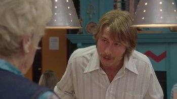 Movie still from “Everybody Wants Some!!” (2016), directed by Richard Linklater – A person wearing a shirt; Close Up shot, Over the shoulder angle