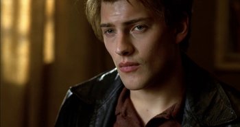 Movie still from “Evil” (2003), directed by Mikael Håfström – A person wearing a leather jacket; Close Up shot, Low angle