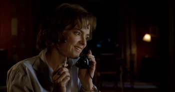 Movie still from “Evil” (2003), directed by Mikael Håfström – A woman holding a phone up to her ear; Close Up shot, Low angle