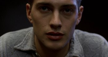 Movie still from “Evil” (2003), directed by Mikael Håfström – A young man's face; Close Up shot, High angle