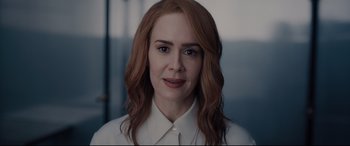 Movie still from “Glass” (2019), directed by M. Night Shyamalan – A person wearing a white shirt; Close Up shot, Over the shoulder angle