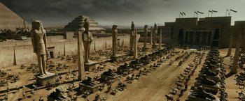 Movie still from “Exodus: Gods and Kings” (2014), directed by Ridley Scott – An ancient egyptian city with a lot of statues and horses; Extreme Wide shot, High angle