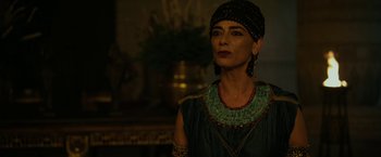 Movie still from “Exodus: Gods and Kings” (2014), directed by Ridley Scott – A woman wearing a head scarf and a necklace; Close Up shot, Over the shoulder angle