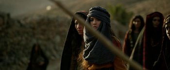 Movie still from “Exodus: Gods and Kings” (2014), directed by Ridley Scott – Two women are standing next to each other; Close Up shot, Over the shoulder angle