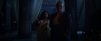 Movie still from “Exodus: Gods and Kings” (2014), directed by Ridley Scott – A man and a woman standing next to each other; Medium shot, Low angle