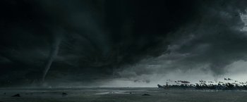 Movie still from “Exodus: Gods and Kings” (2014), directed by Ridley Scott – A storm is coming in the distance with dark clouds above it; Extreme Wide shot, Low angle